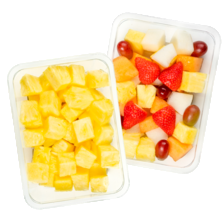 Ananas, mango of watermeloen blokjes of fruitsalade ananas/druif